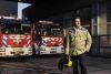 Medewerker van Veiligheidsregio Zuid-Holland Zuid in de brandweer kazerne. 